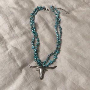 Silver and turquoise necklace with bull head